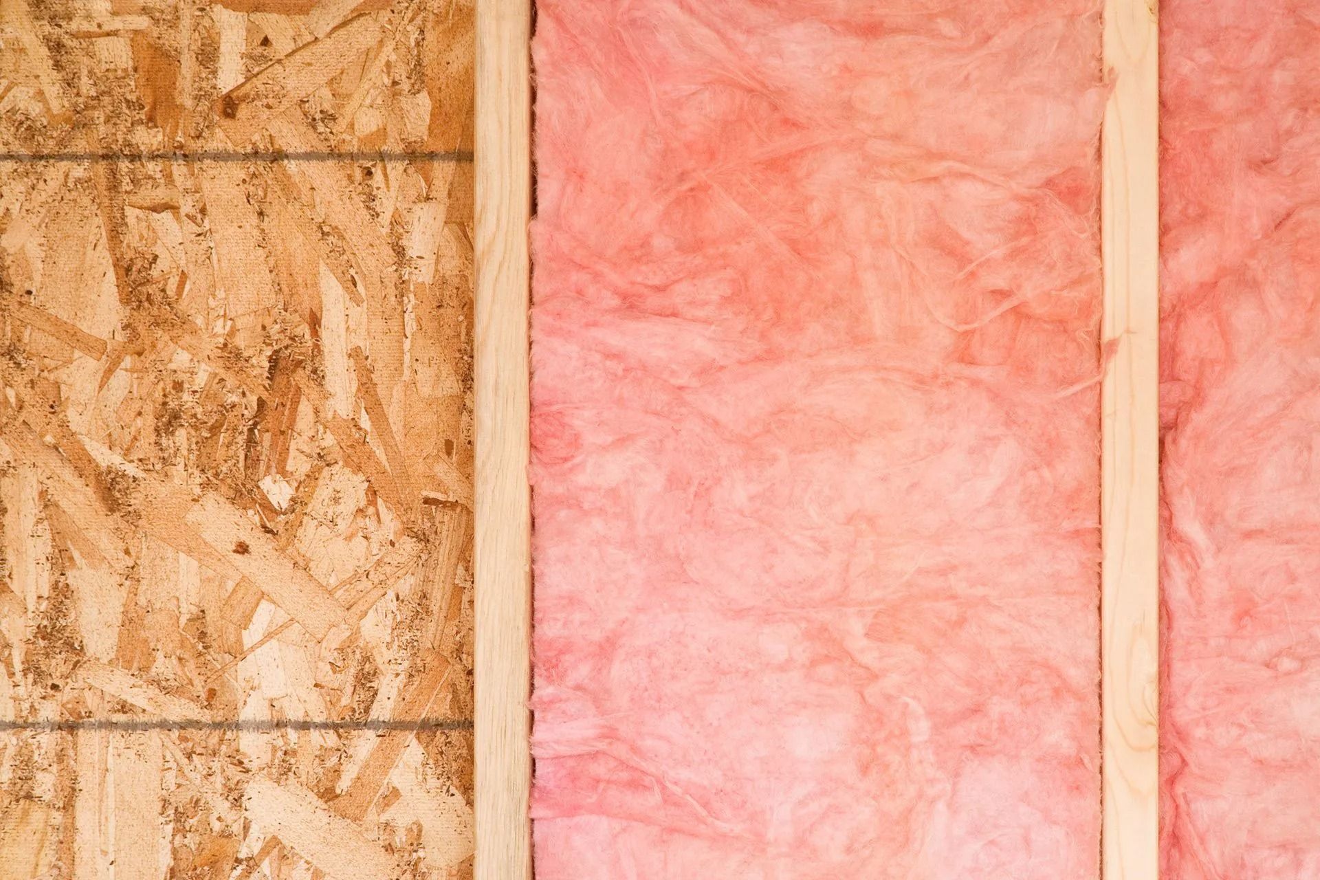 Fiberglass batt insulation fitted between wall studs in a Middle Tennessee home