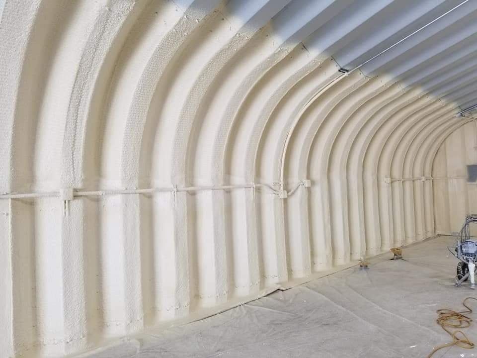 Arched metal building fully insulated with spray foam