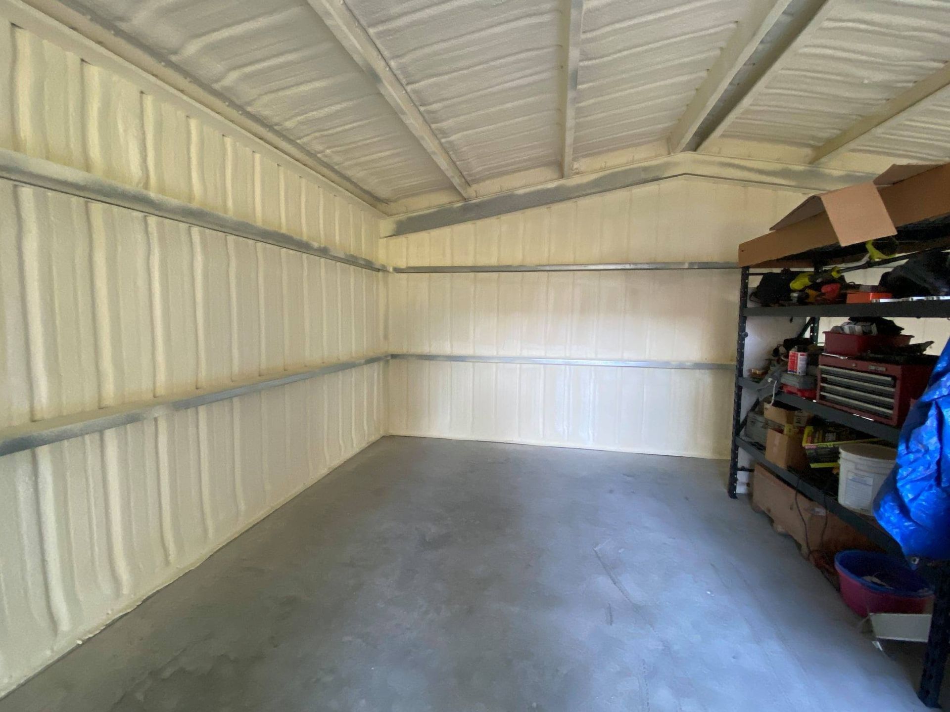 Insulated garage bay in a Middle Tennessee metal building