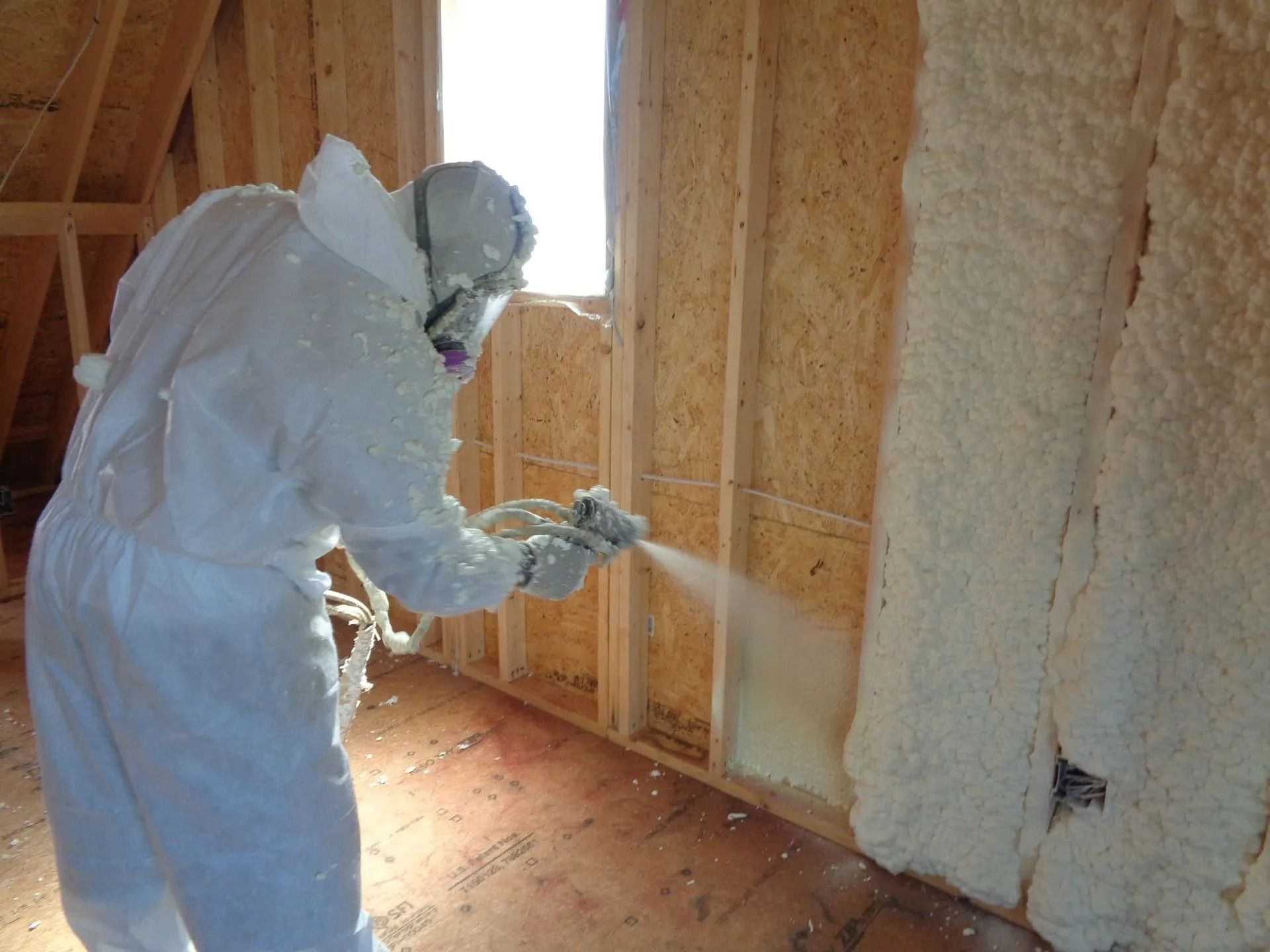 Spray foam applied between wall studs on a house under construction in Middle Tennessee