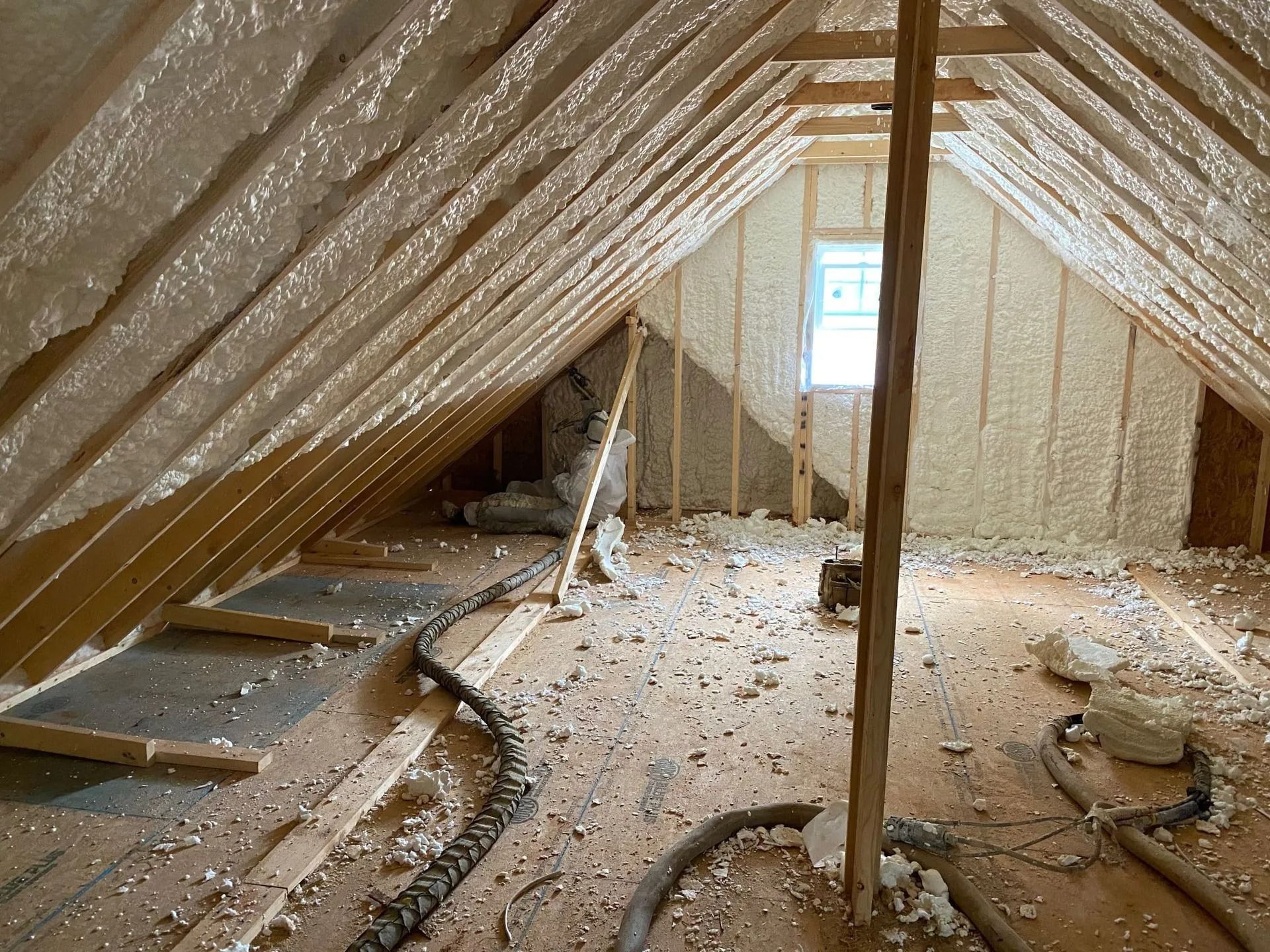 Spray foam applied to attic rafters and roof deck