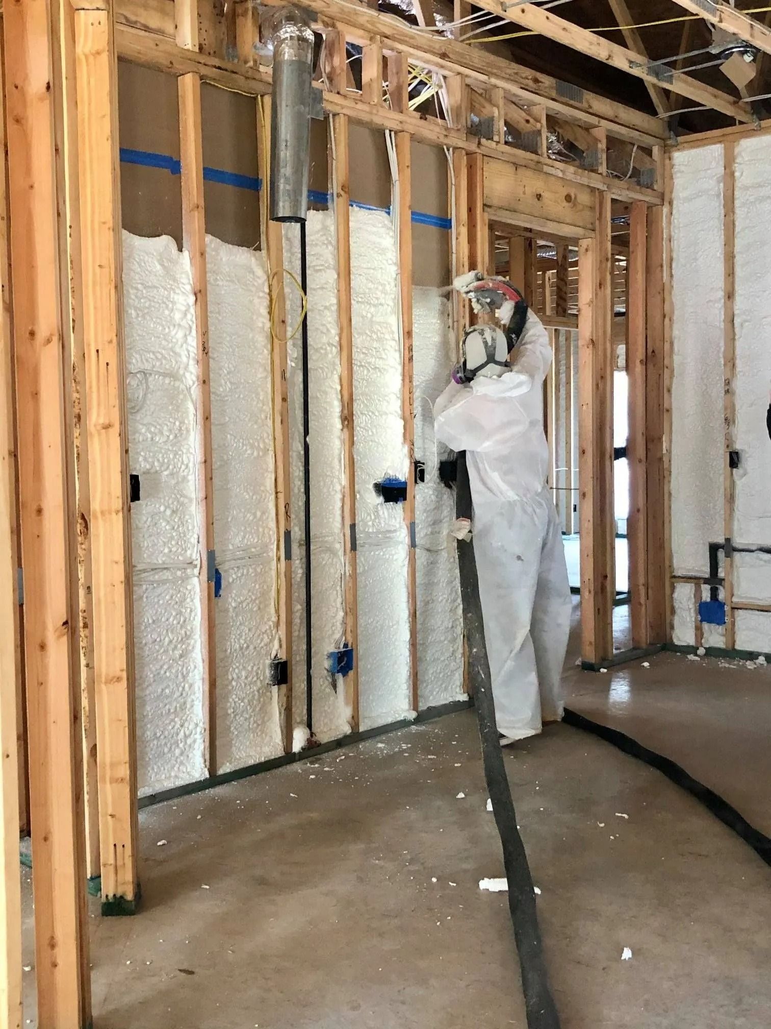 Interior framing insulated with spray foam before drywall