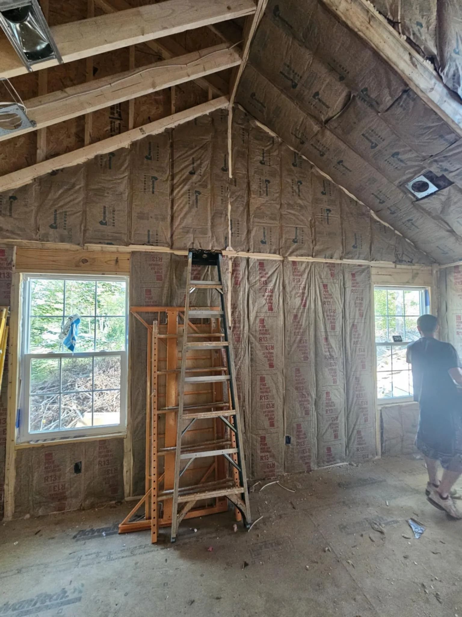 Barn framing insulated with spray foam