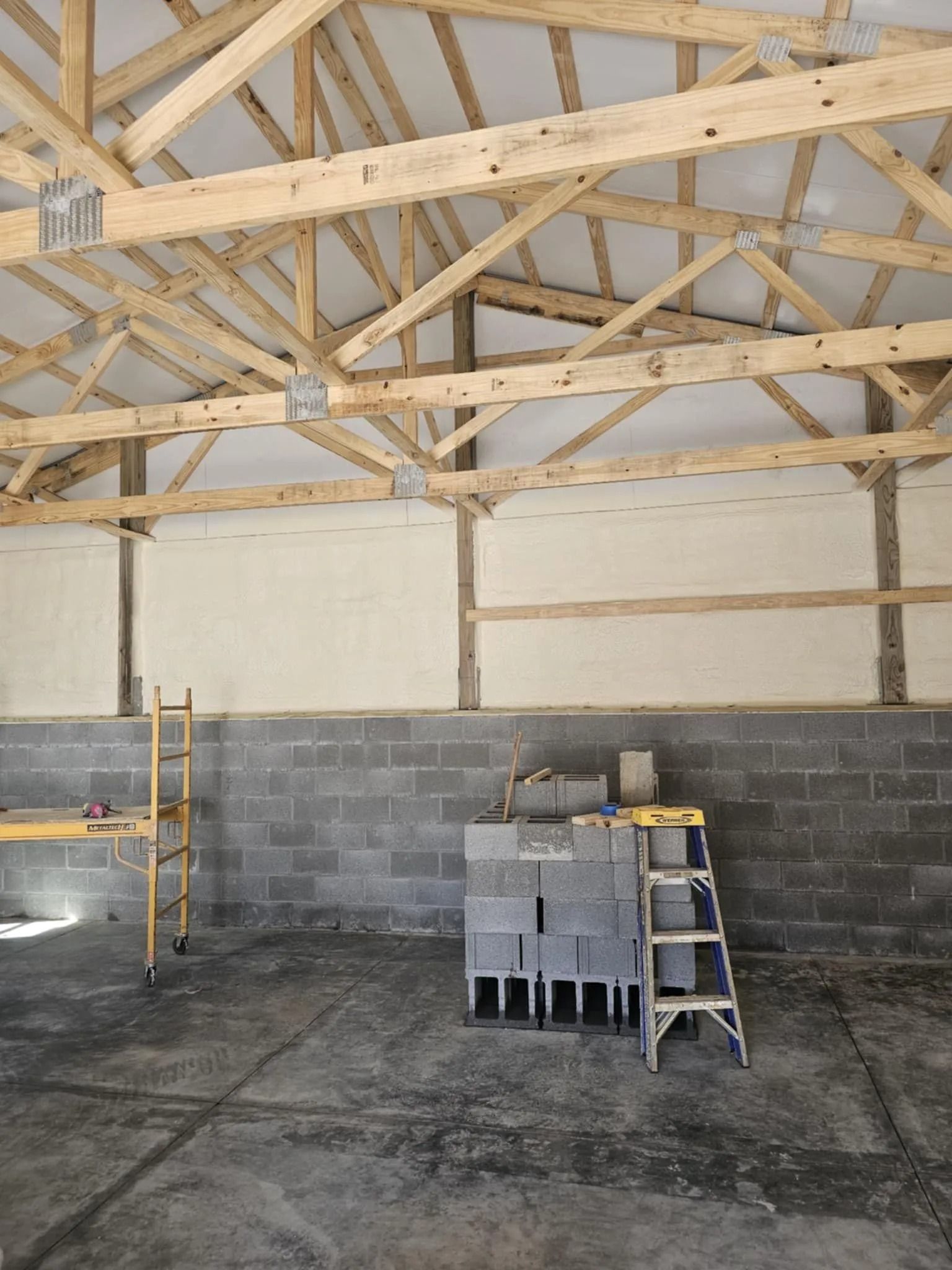 Timber framed building after spray foam application