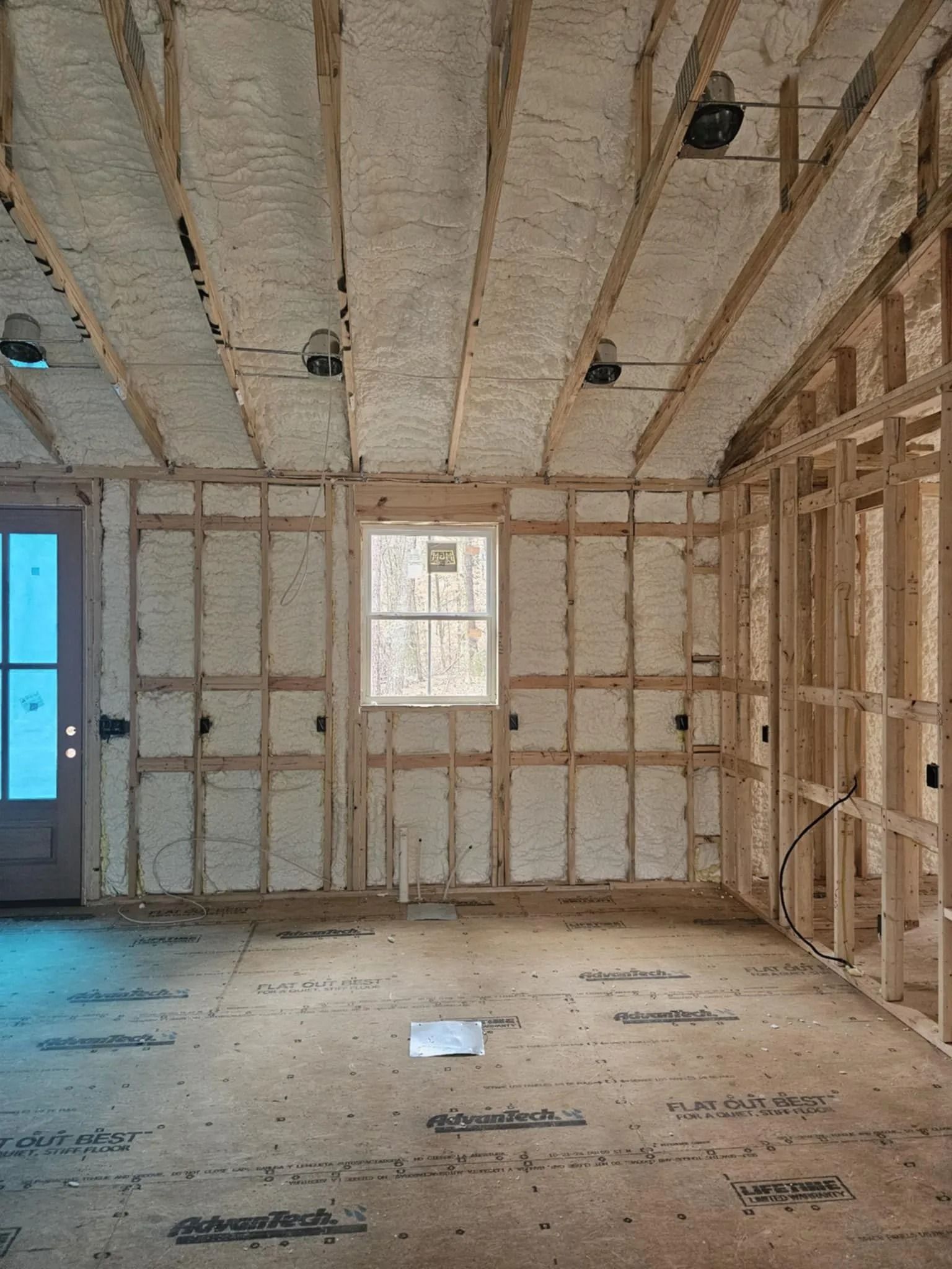 Garage framing insulated with spray foam